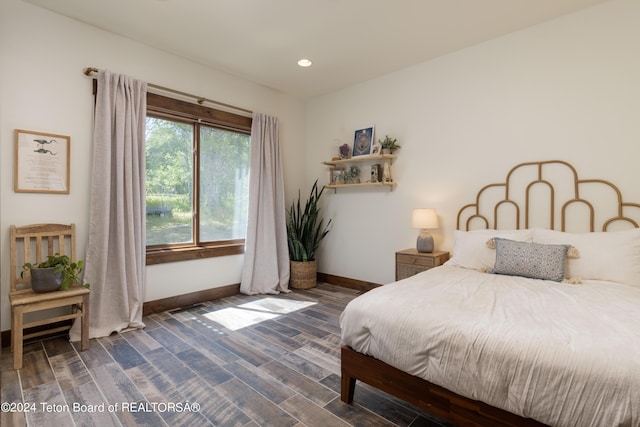 bedroom featuring dark hardwood / wood-style floors