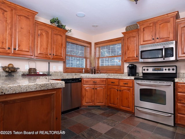 kitchen with sink and stainless steel appliances