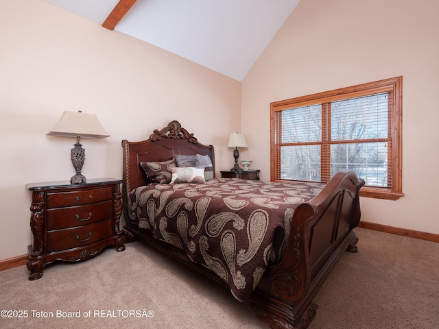 bedroom featuring light colored carpet and lofted ceiling