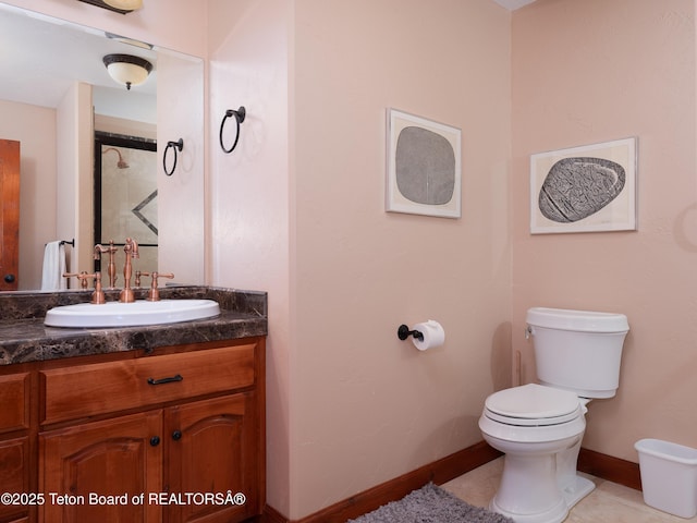 bathroom with toilet and vanity