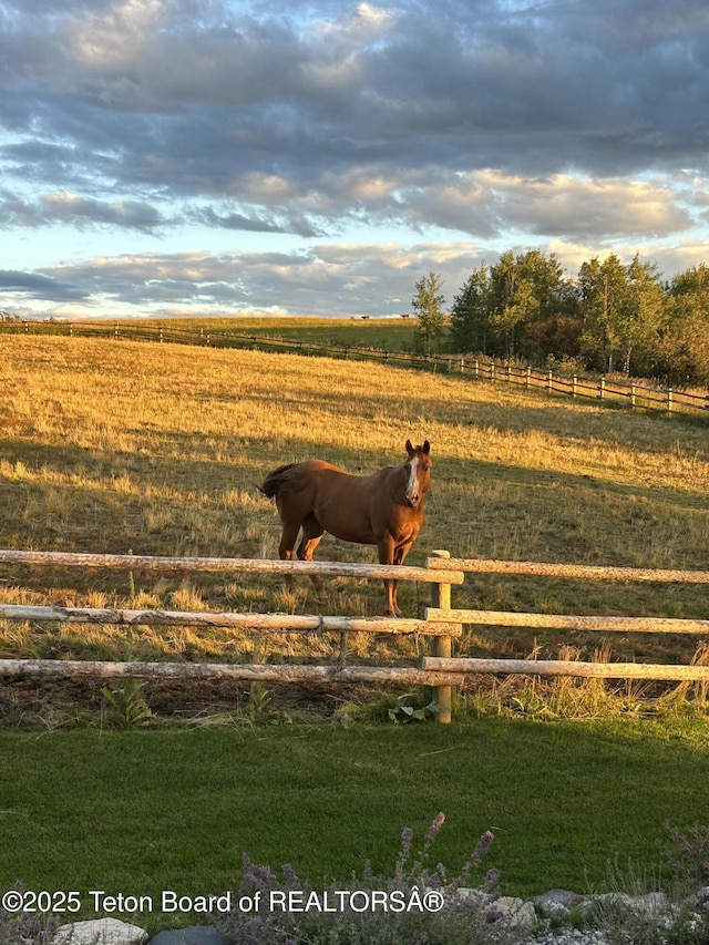 exterior space with a rural view