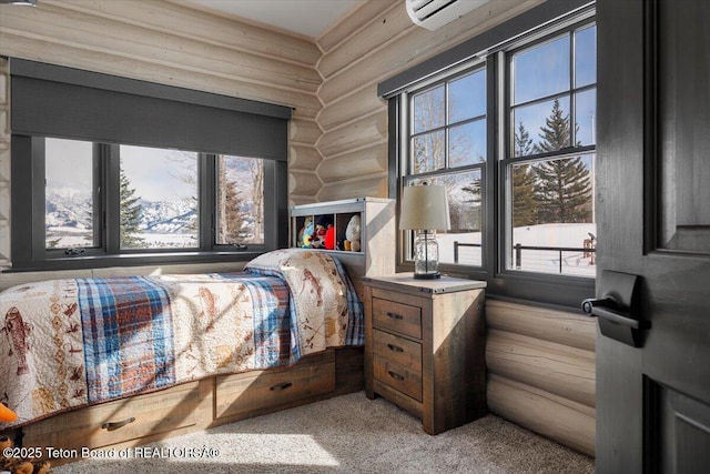 bedroom featuring carpet floors, log walls, and an AC wall unit