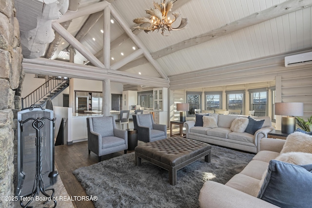 living area with a notable chandelier, dark wood-type flooring, an AC wall unit, high vaulted ceiling, and beamed ceiling