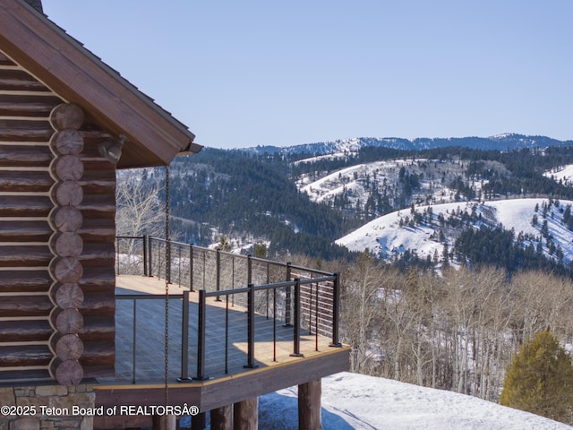 property view of mountains featuring a wooded view