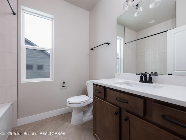 full bathroom featuring toilet, tiled shower / bath combo, tile patterned floors, and vanity