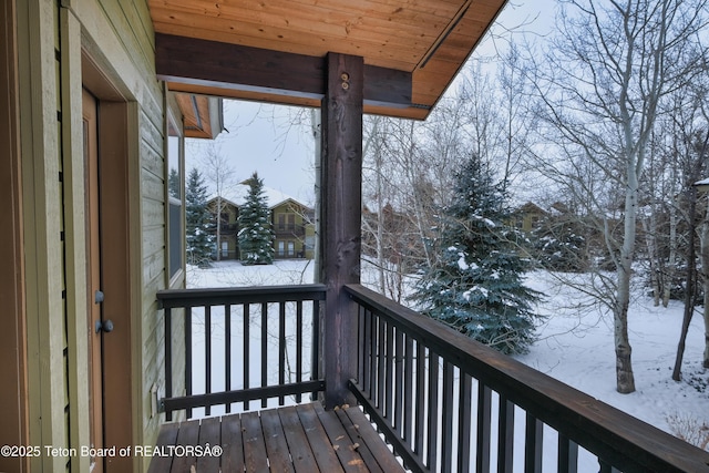 view of snow covered deck