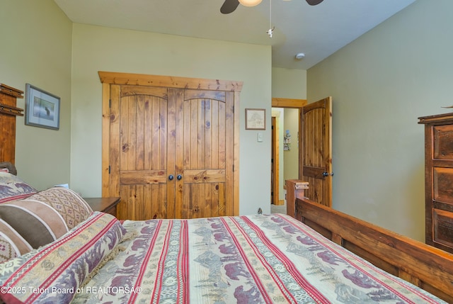 bedroom featuring ceiling fan and a closet