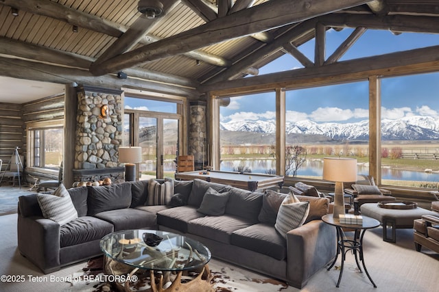 living room featuring wood ceiling, pool table, a water and mountain view, log walls, and vaulted ceiling with beams