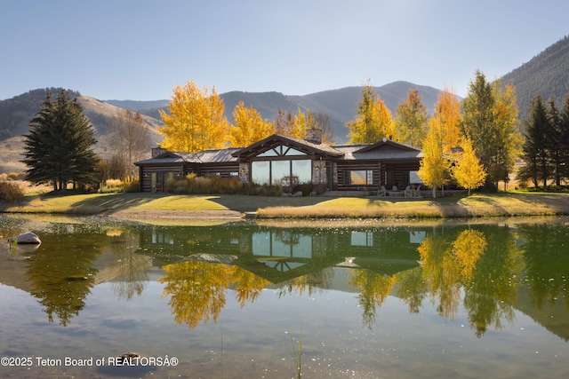 property view of water featuring a mountain view