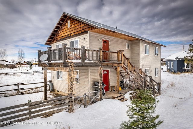 view of front of house featuring a deck