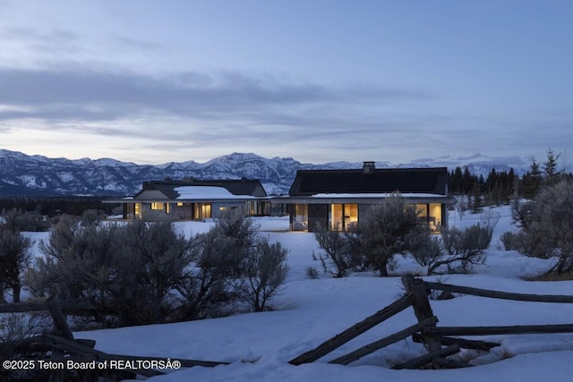 exterior space featuring a mountain view