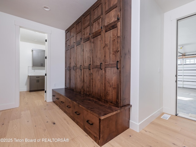 mudroom featuring light wood-type flooring