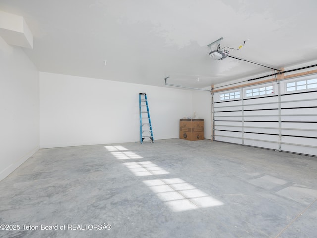 garage featuring a garage door opener