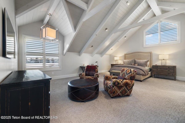 bedroom featuring carpet floors and lofted ceiling with beams