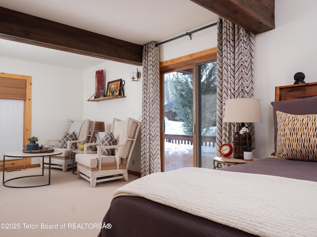 bedroom with carpet flooring, beam ceiling, and access to outside