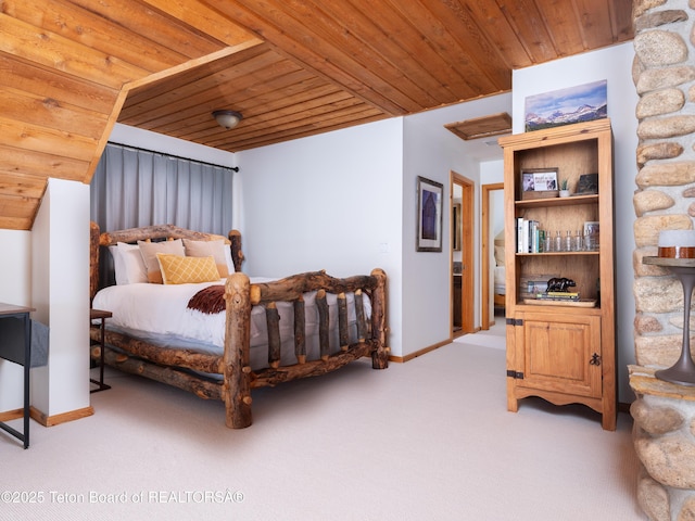 carpeted bedroom featuring wood ceiling