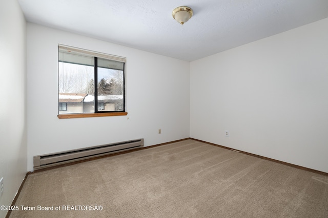 unfurnished room with a baseboard radiator and light carpet