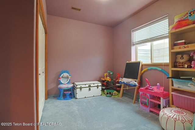 game room with light carpet