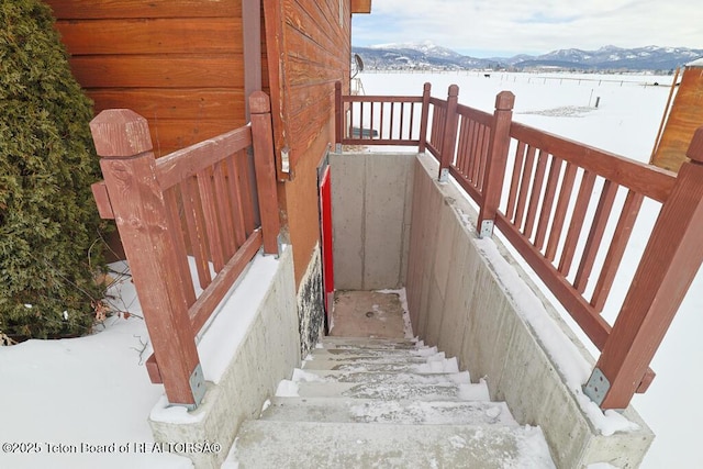 staircase featuring a mountain view