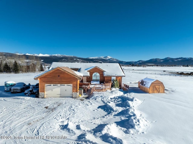 view of front of home featuring a mountain view