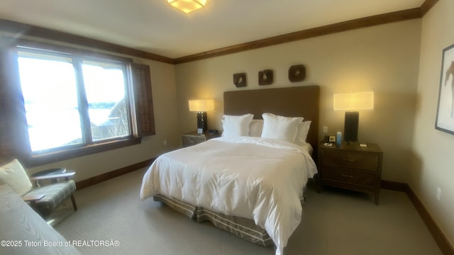 carpeted bedroom with ornamental molding