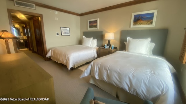 carpeted bedroom with crown molding