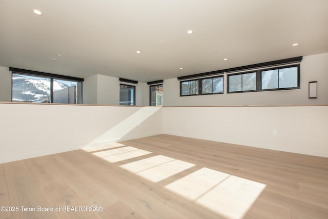 unfurnished room featuring light wood-type flooring