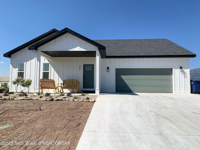 view of front of home featuring a garage and covered porch