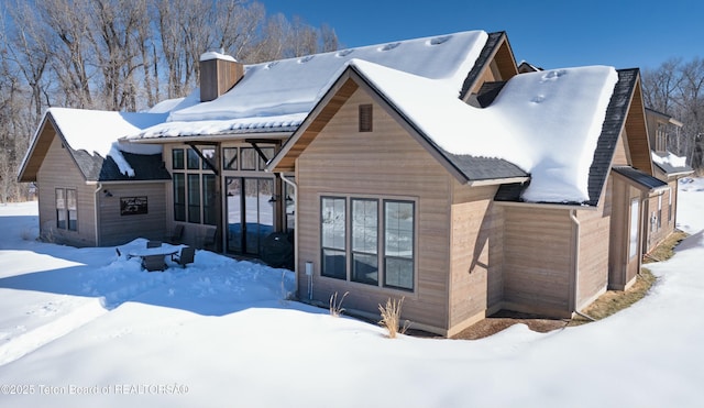 view of snow covered property