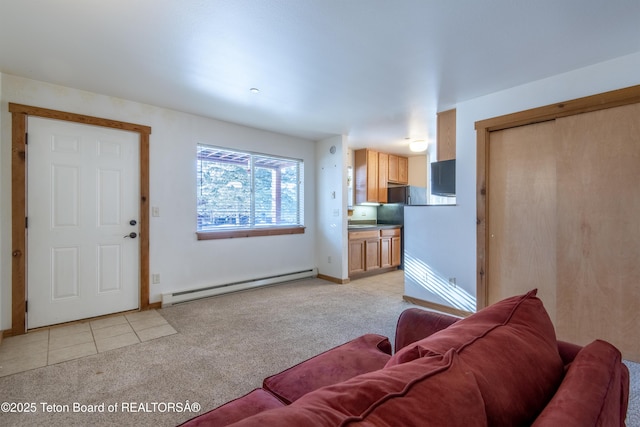 carpeted living room featuring baseboard heating