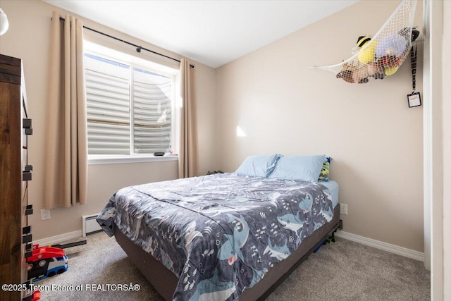 bedroom featuring carpet and a baseboard heating unit