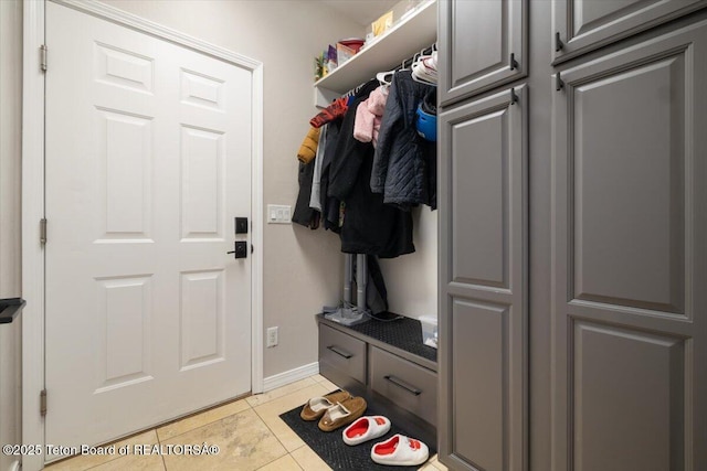 mudroom with light tile patterned floors