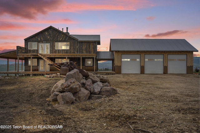 view of front of property with a garage