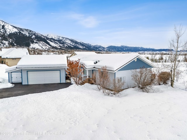 view of front of home featuring a mountain view