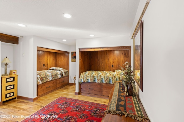 bedroom with light wood-type flooring