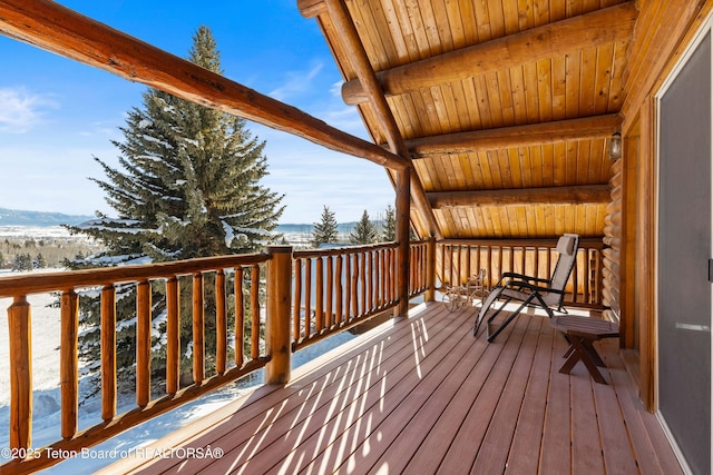 view of snow covered deck