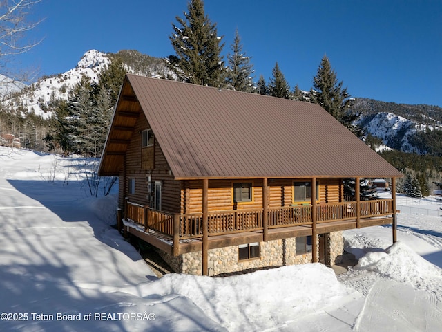 log cabin with a mountain view