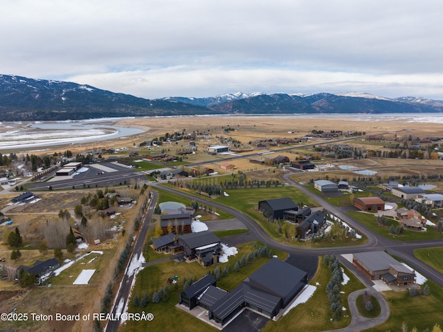 drone / aerial view featuring a mountain view