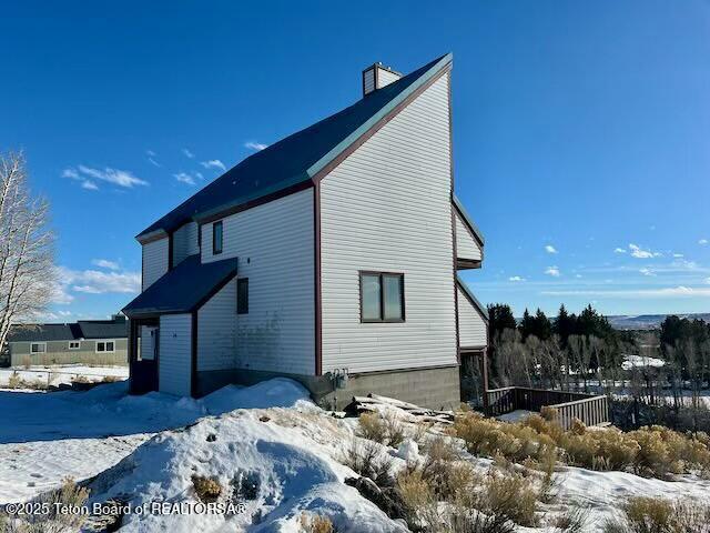 view of snow covered exterior