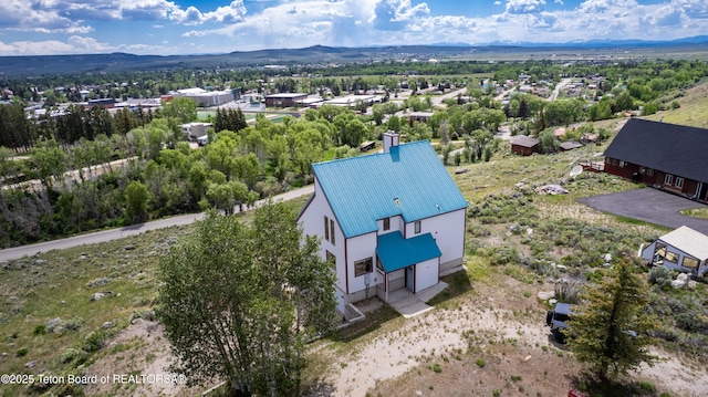 19 Orcutt Dr, Pinedale, WY 82941 - view of subject property with a mountain backdrop