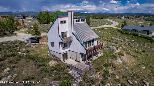 19 Orcutt Dr, Pinedale, WY 82941 - view of subject property featuring a mountainous background