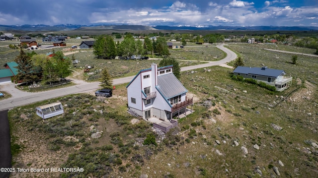19 Orcutt Dr, Pinedale, WY 82941 - view of subject property with a mountainous background