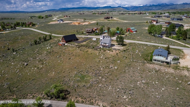 19 Orcutt Dr, Pinedale, WY 82941 - overview of rural landscape with a mountainous background