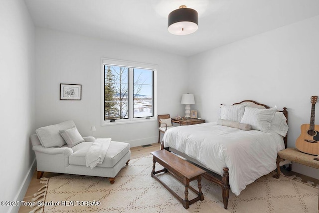 bedroom featuring light wood-type flooring