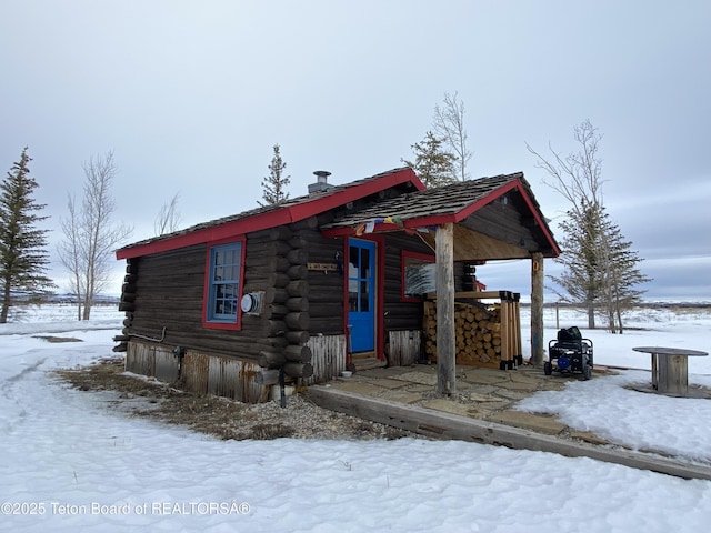 view of front facade with log exterior