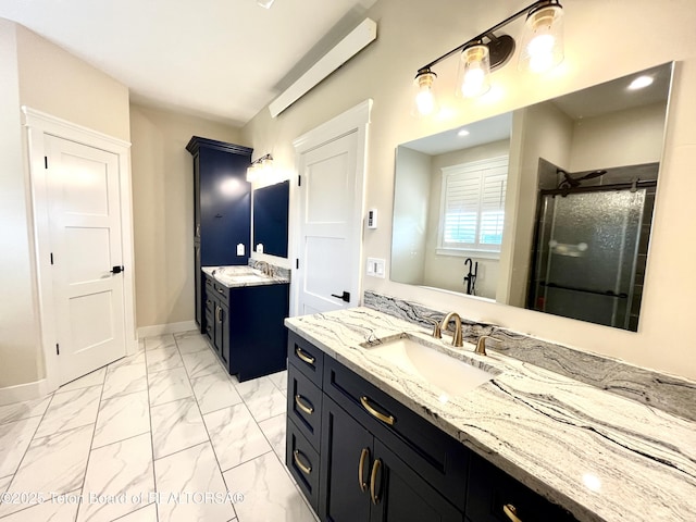 bathroom with vanity and an enclosed shower