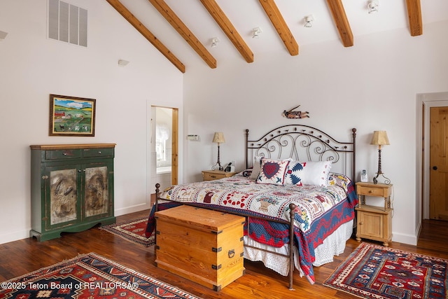 bedroom featuring high vaulted ceiling, beam ceiling, visible vents, and wood finished floors