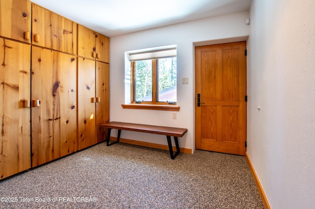 interior space with baseboards