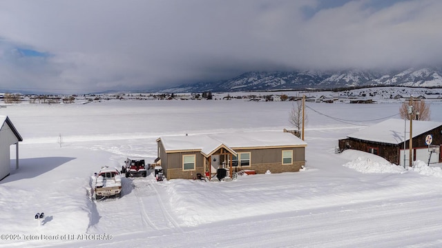 420 Roberts St, Thayne, WY 83127 - view of front of home with a mountain view