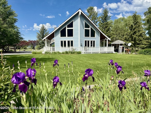 388 Middle Branch Dr, Star Valley Ranch, WY 83127 - rear view of house featuring a yard